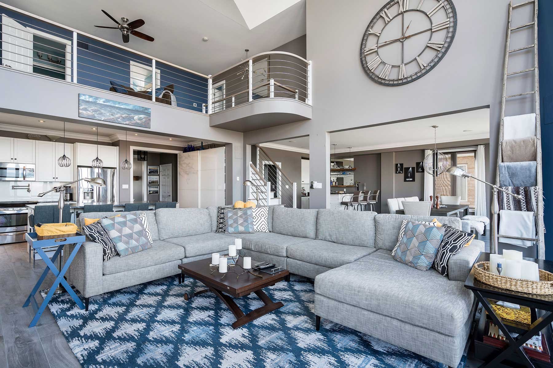 An interior, real estate photo of a living room and kitchen in Wasaga Beach Ontario.