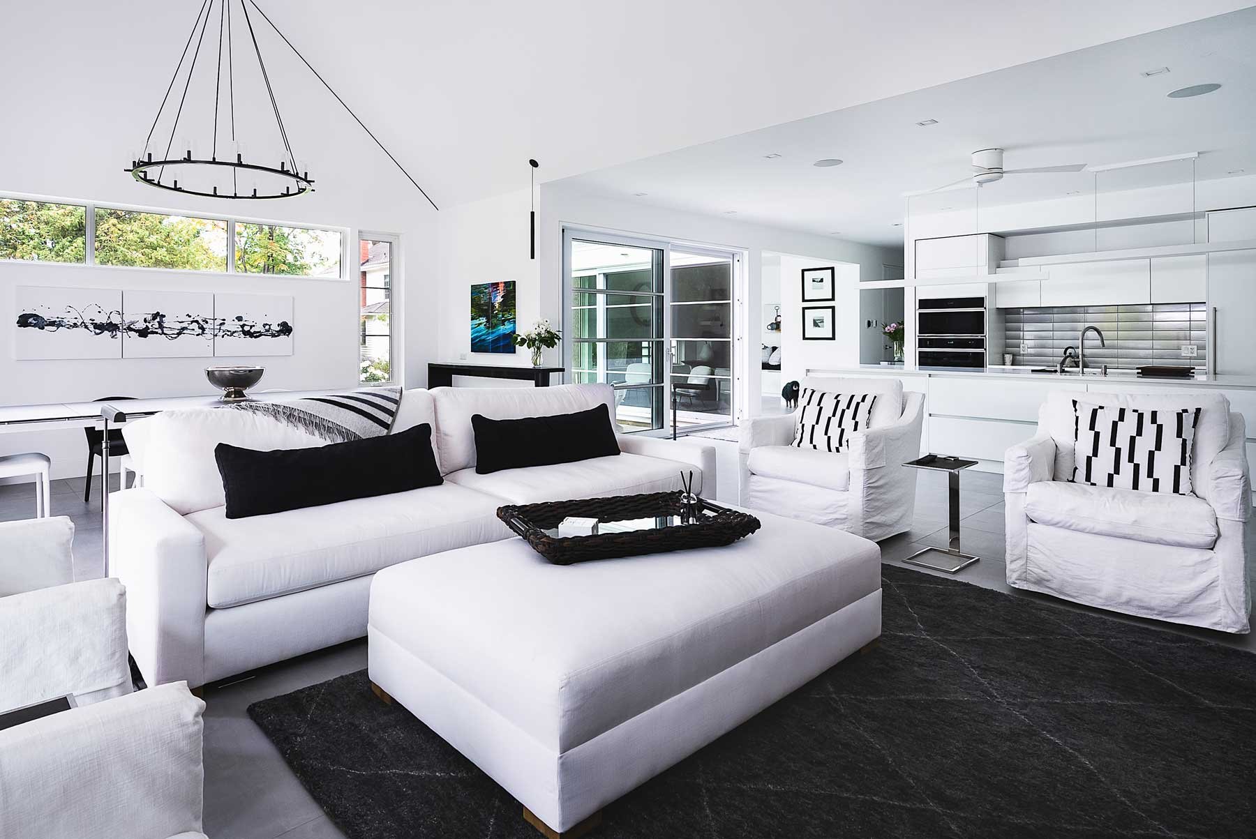 A modern and minimal home interior with a white and black design.