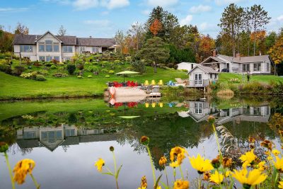 A large backyard with a pond in Clearview, Ontario, Canada.